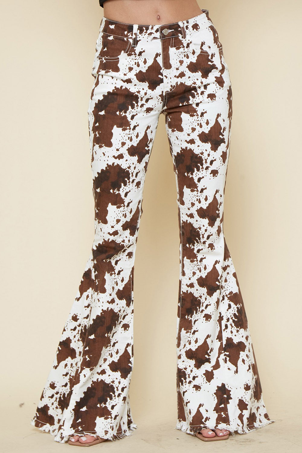 COW PRINT FLARED DENIM PANTS