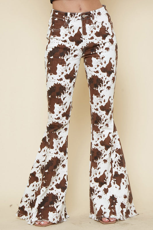 COW PRINT FLARED DENIM PANTS