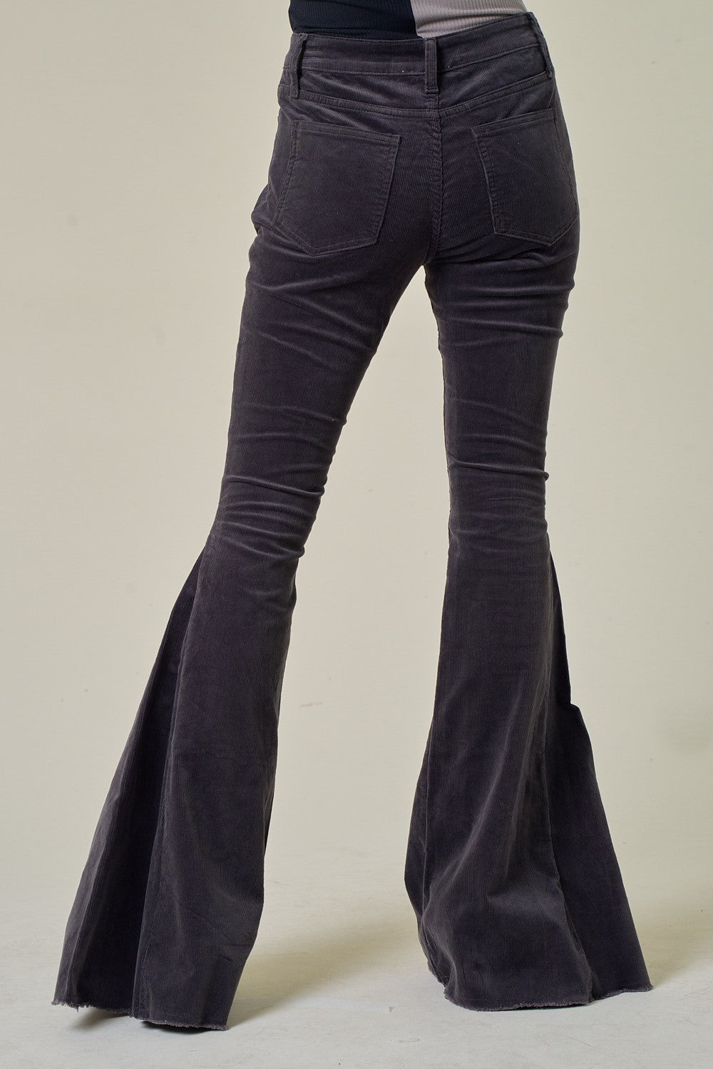 CORDUROY FLARED PANTS WITH DISTRESSED HEM